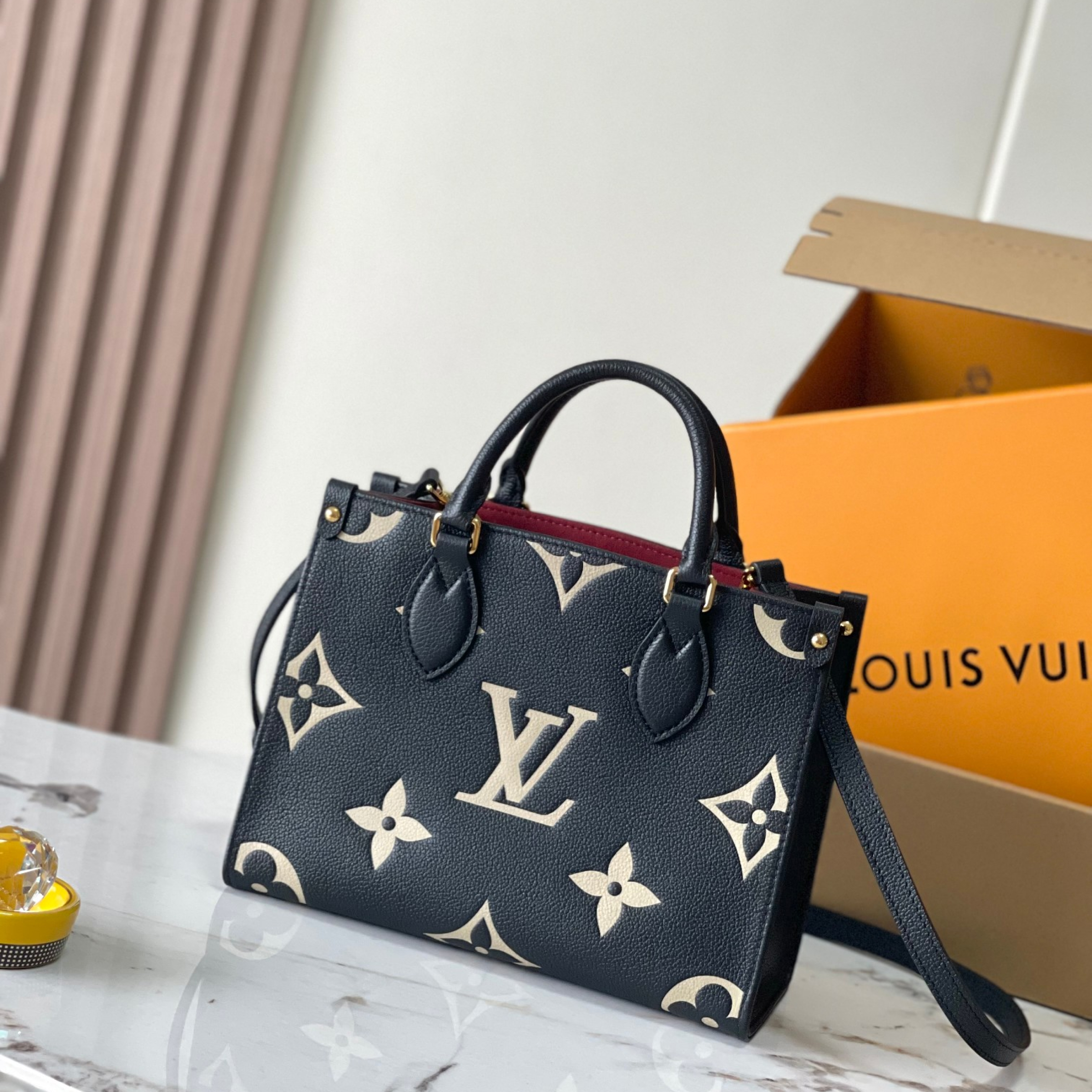 LOUIS VUITTON LV Bicolor Monogram Empreinte Leather Canvas Onthego PM Black Gold - Bag