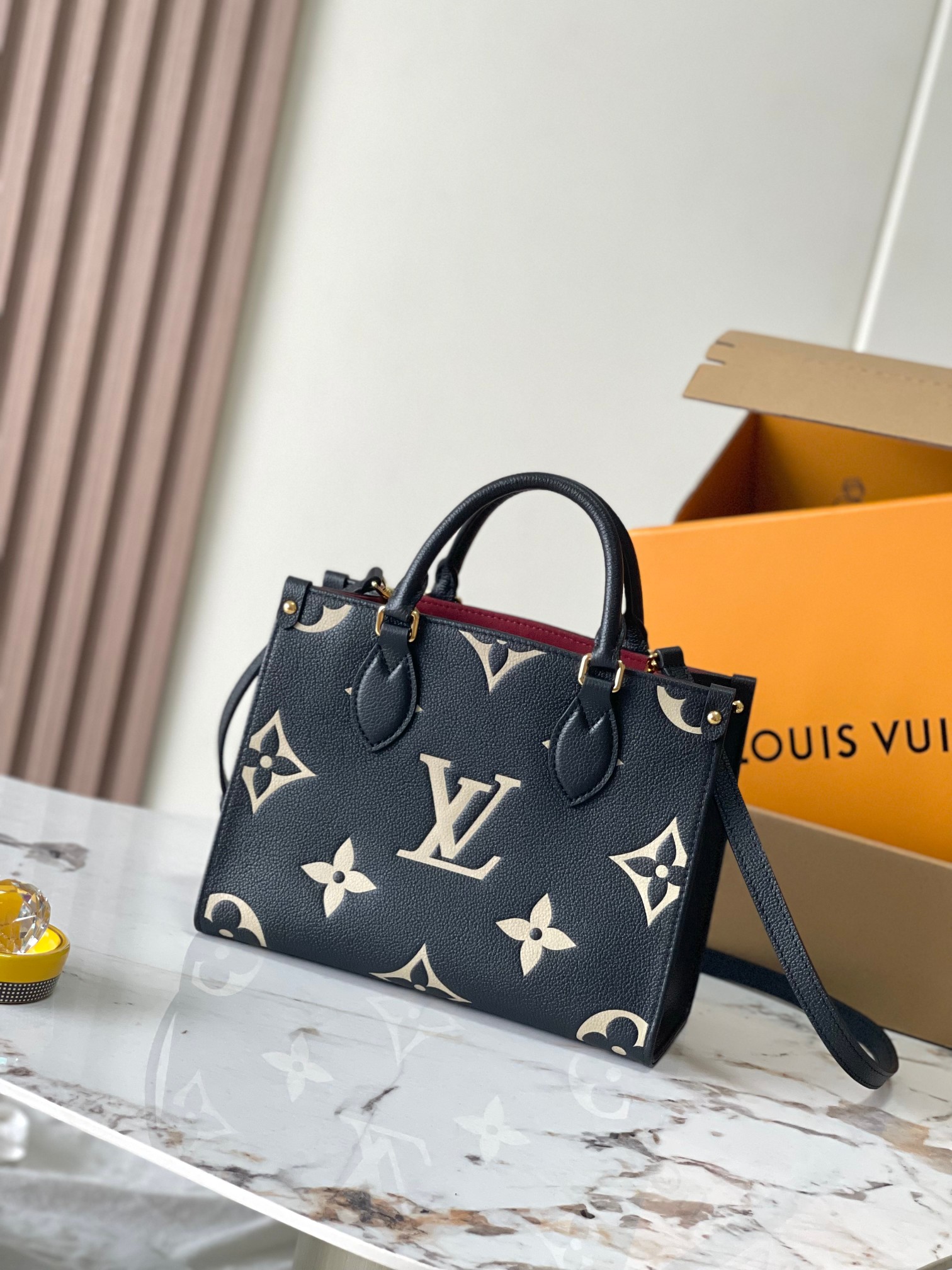 LOUIS VUITTON LV Bicolor Monogram Empreinte Leather Canvas Onthego PM Black Gold - Bag