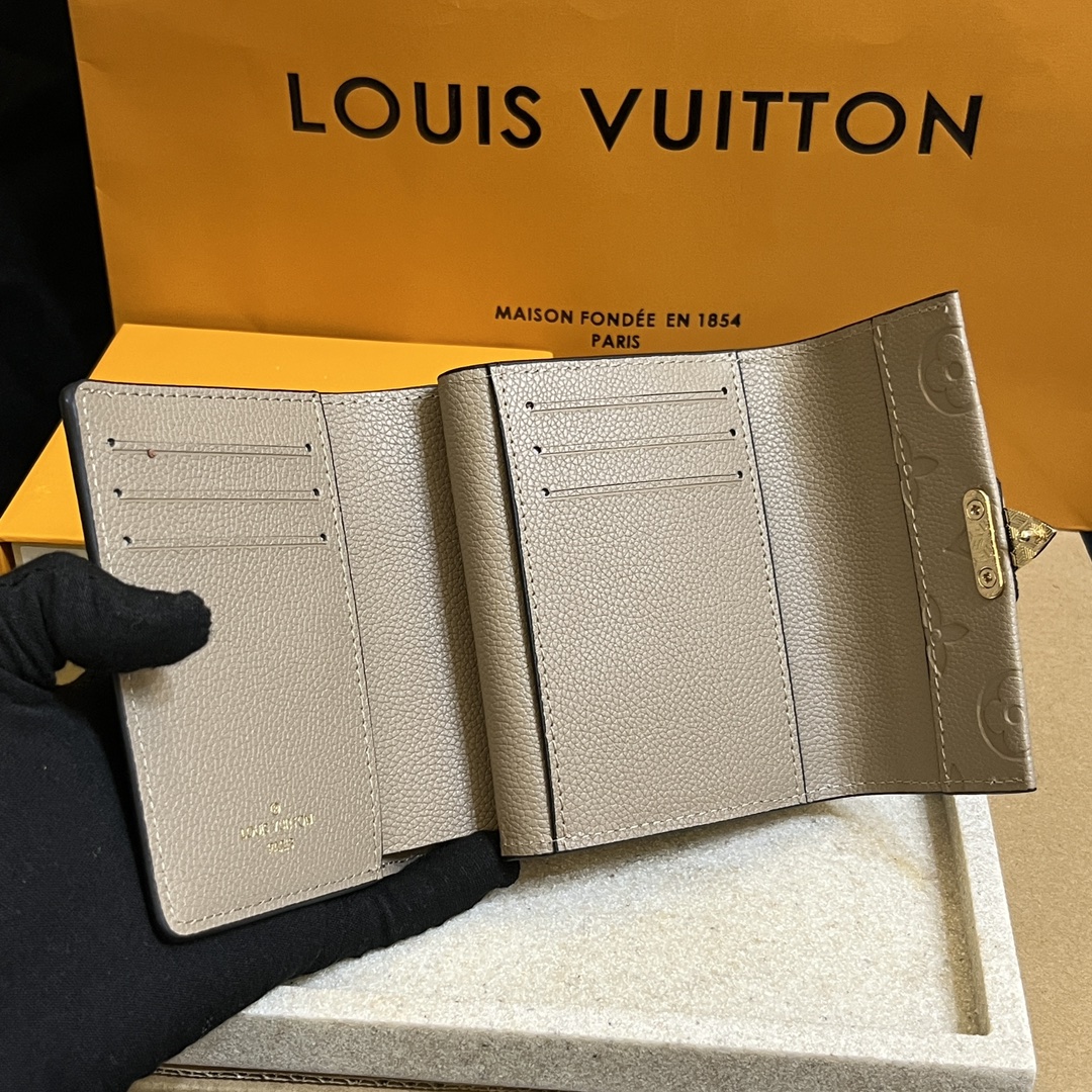 Louis Vuitton LV Métis Monogram Empreinte Wallet-Elephant Gray Wallet